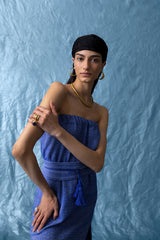 Strapless blue dress with tassel belt and rafia fringe on the hemline