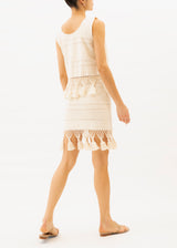 ecru mini skirt with tassels at the hemline