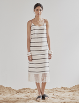 A model wearing a cotton handloomed black and ecru sleeveless dress