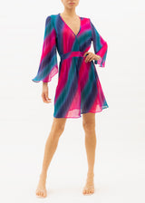 The model is wearing a striped mini dress