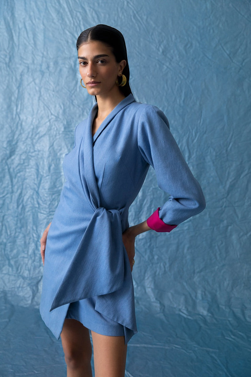 light blue denim blazer wrap dress with pink sleeve cuffs