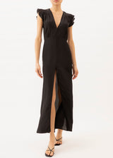 Model is wearing a Black maxi dress with front slit