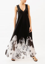 The model is wearing a Black dress with ink effect chiffon inserts at the bottom