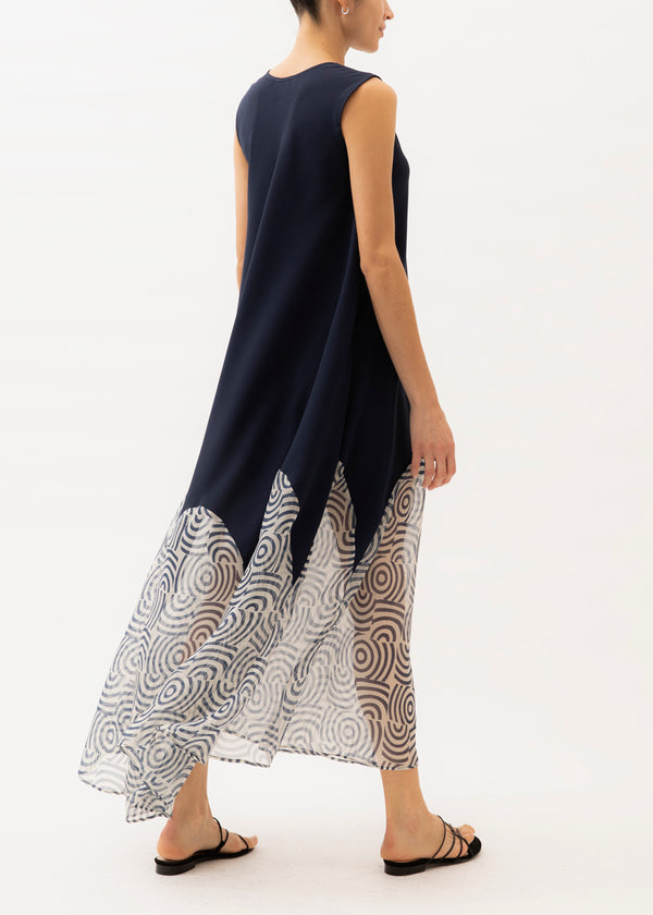 navy blue dress that fades into black and white pattern