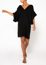 The model is wearing a Navy silk kimono dress
